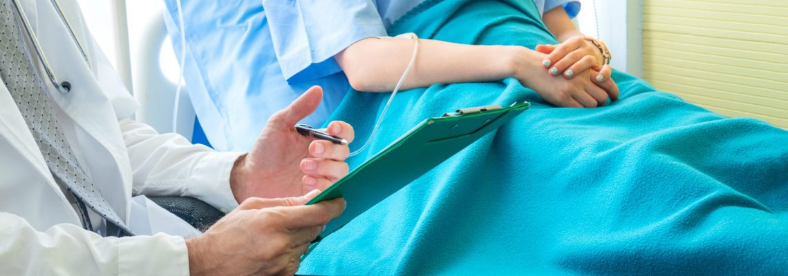 Doctor check up and discuss with patient in clinic or doctor talk with women patient in hospital